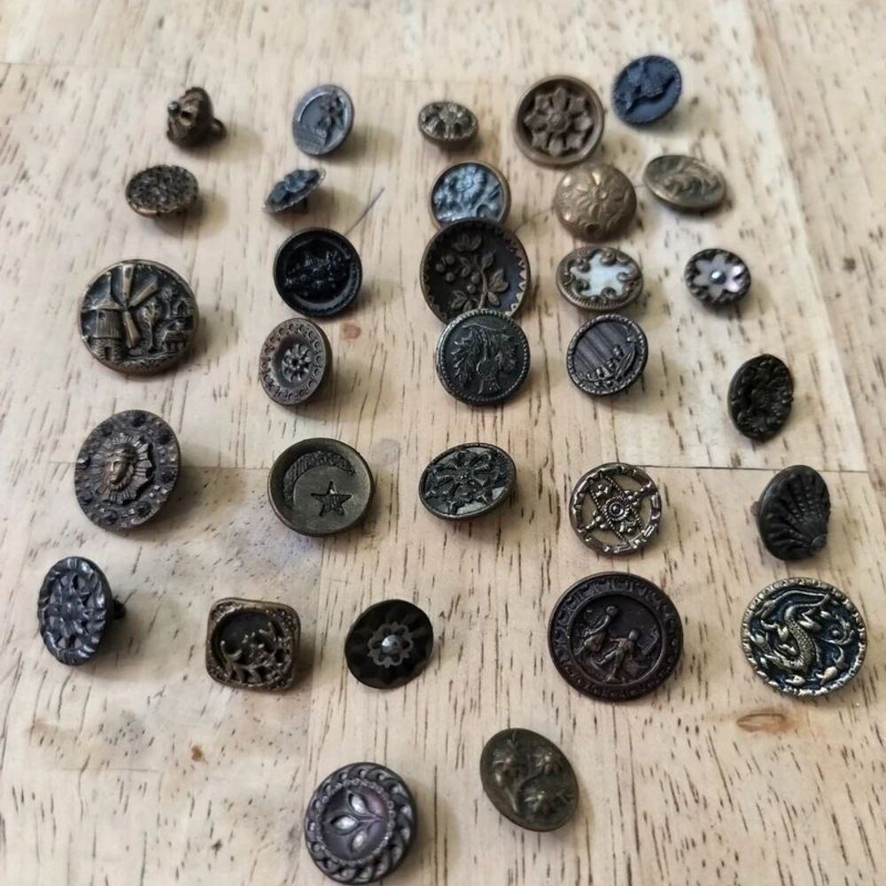 Vintage lot of 31 Victorian metal picture buttons shank style